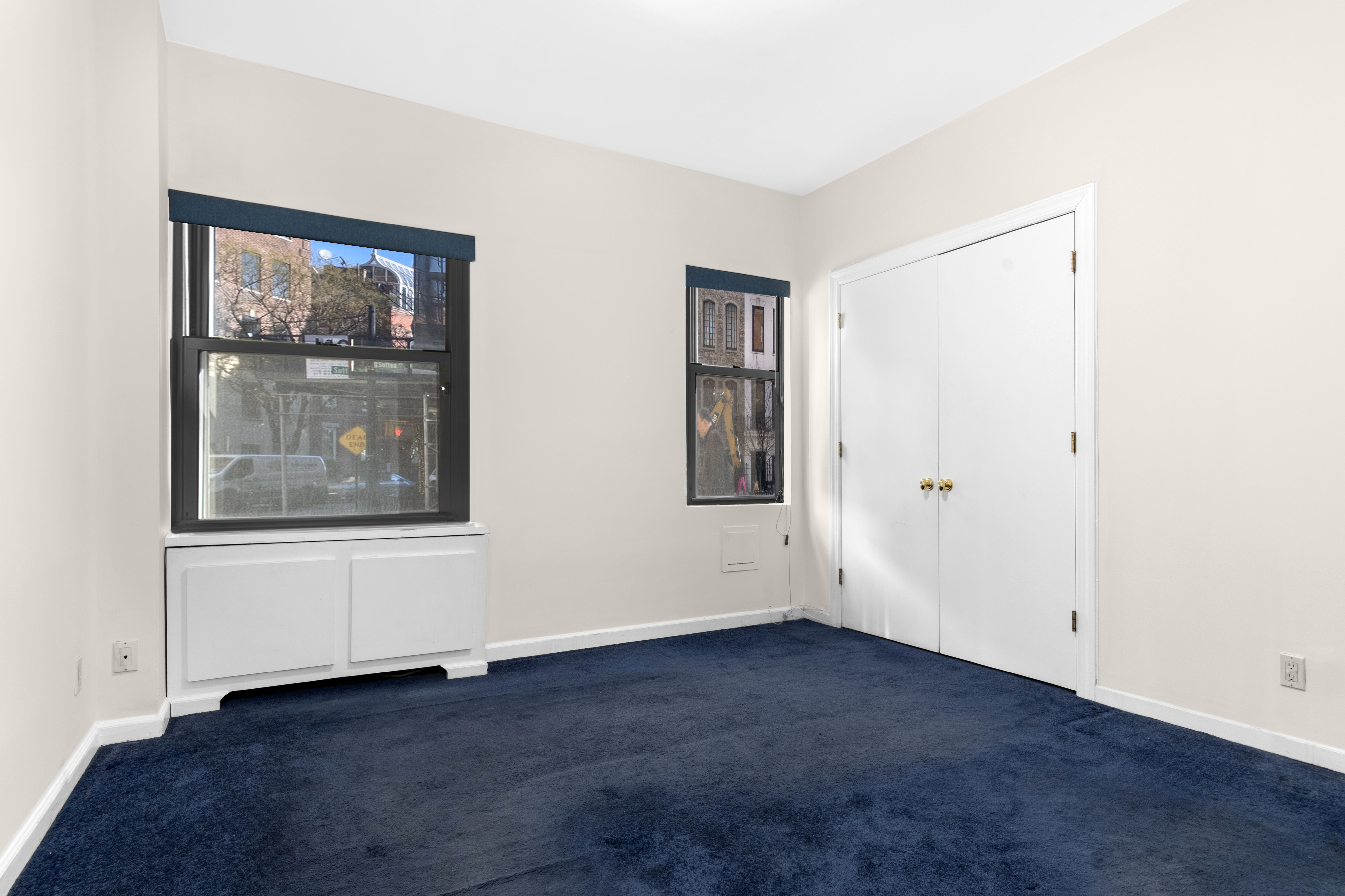 16 Sutton Place, Unit 1A/1B Manhattan, NY 10022 - Photo 17 of 25 an empty room with window