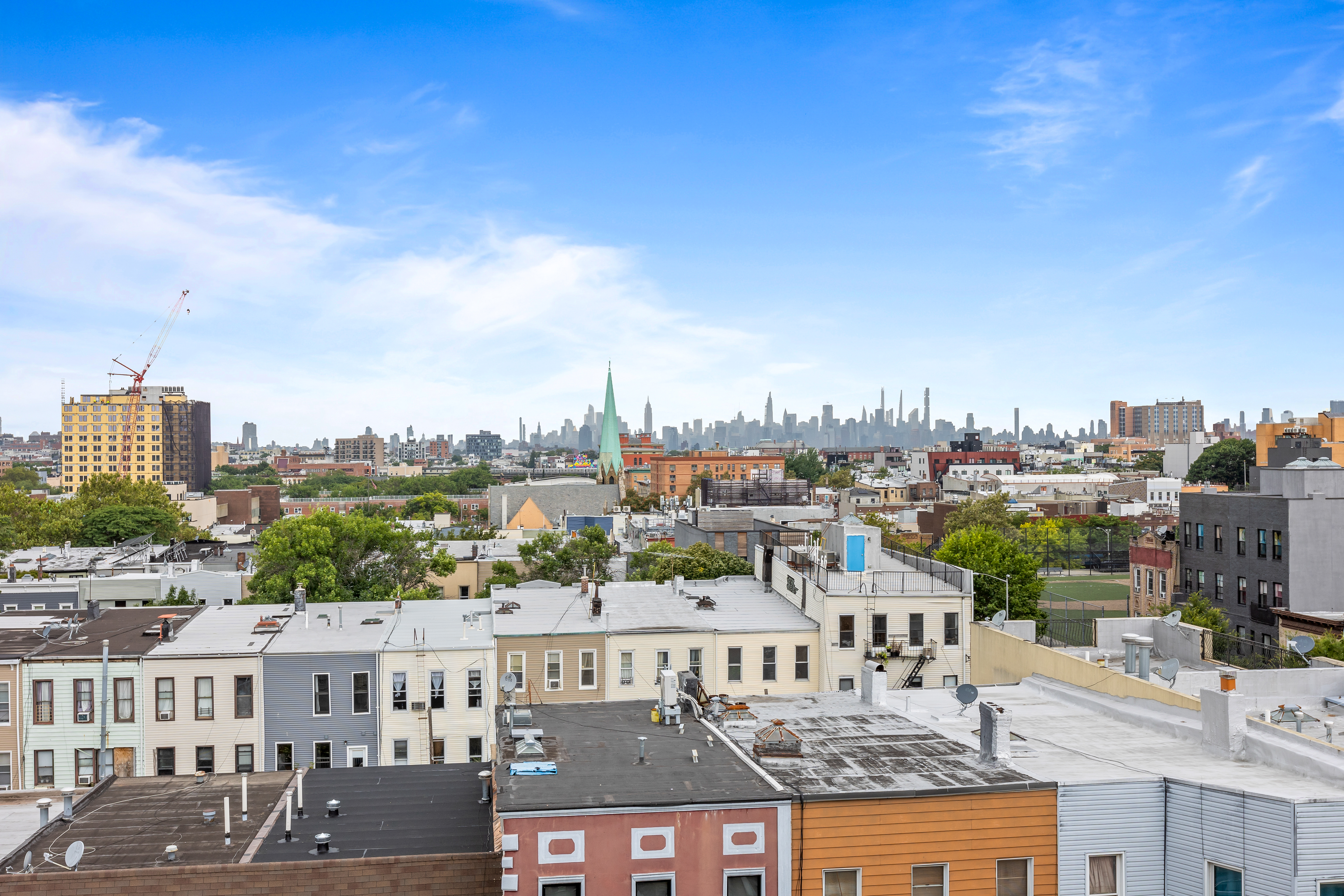 1390 Putnam Avenue, Unit 1F Brooklyn, NY 11221 - Photo 7 of 9 a view of a city with tall buildings