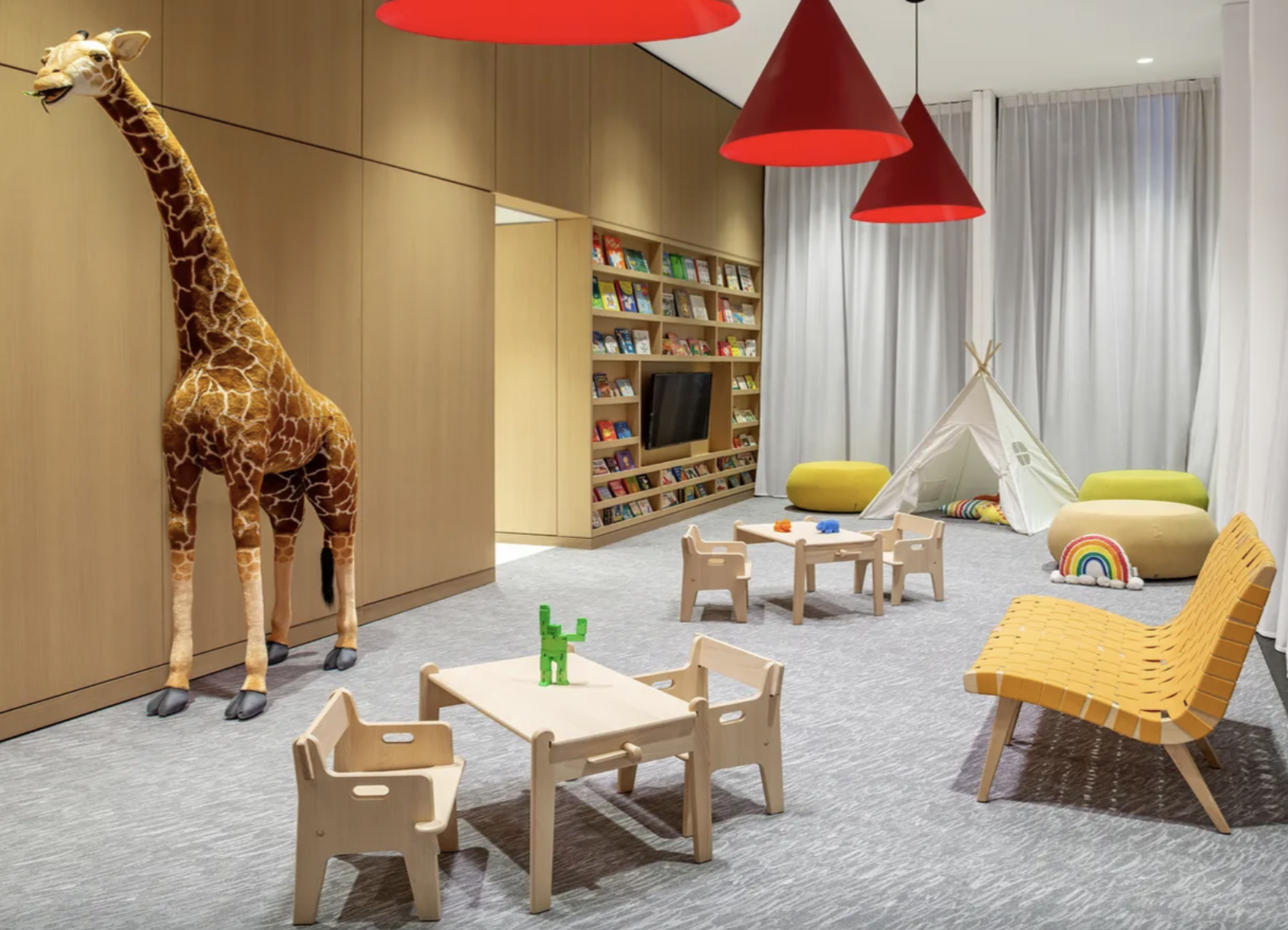 695 1st Avenue, Unit 31C Manhattan, NY 10016 - Photo 20 of 27 a living room with furniture and a window