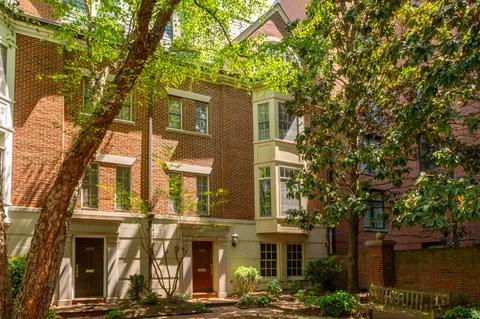 a front view of a multi story residential apartment building