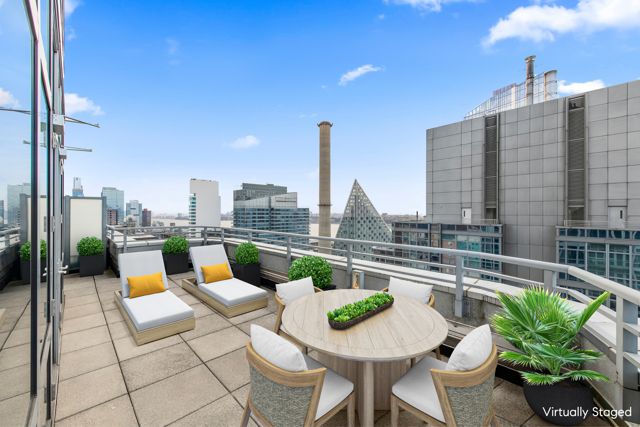 555 West 59th Street, Unit PHA Manhattan, NY 10019 - Photo 5 of 20 a view of roof deck with seating space and potted plants