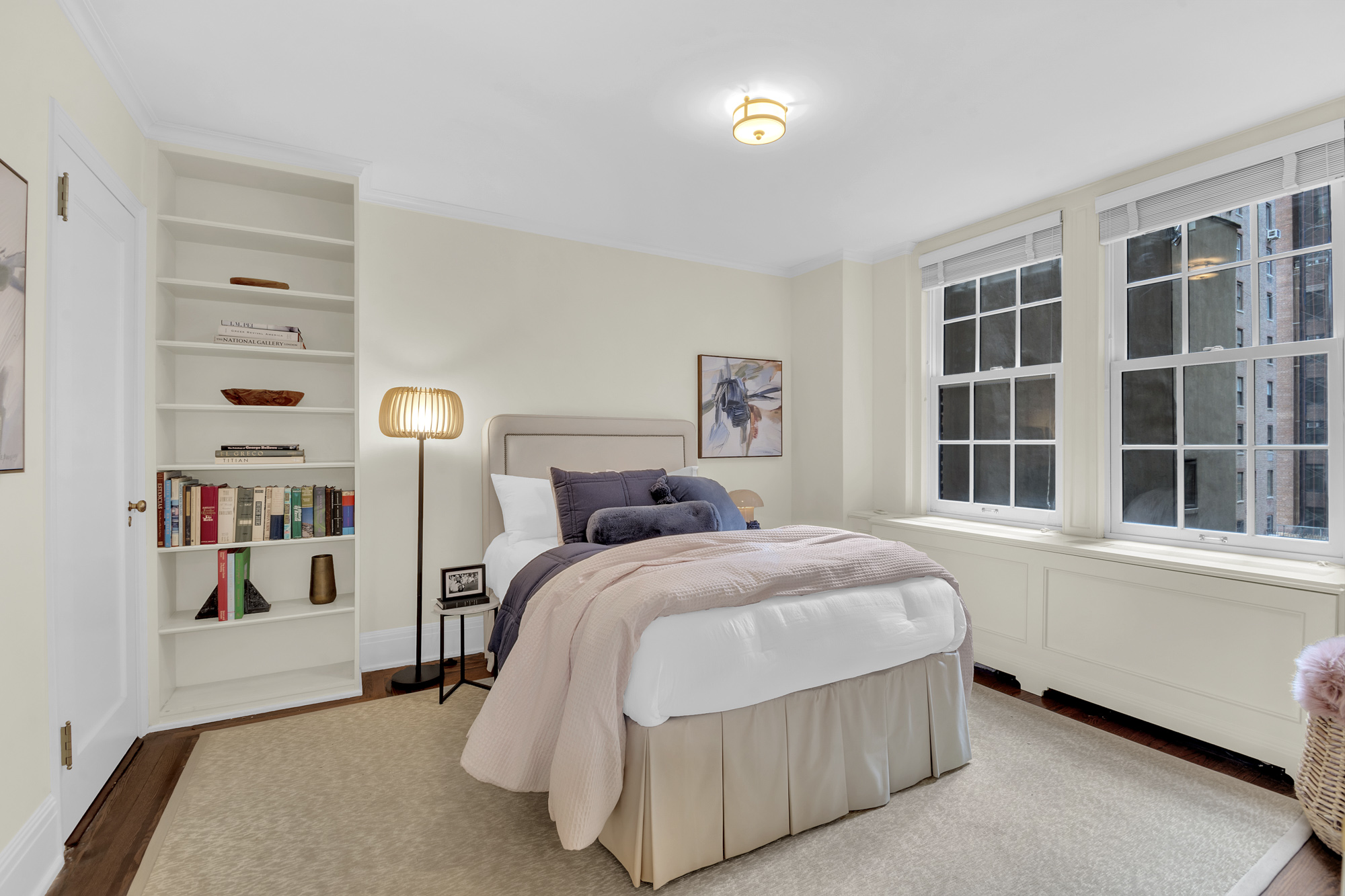 7 Gracie Square, Unit 5A Manhattan, NY 10128 - Photo 11 of 26 a bedroom with a bed and a window