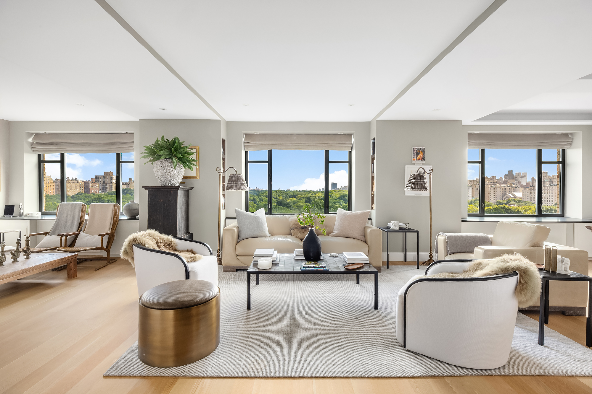 110 Central Park South, Unit 12ABC Manhattan, NY 10019 - Photo 2 of 49 a living room with furniture and a large window