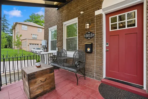 a view of house with a outdoor seating