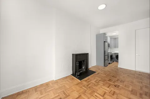 a view of a livingroom with a fireplace