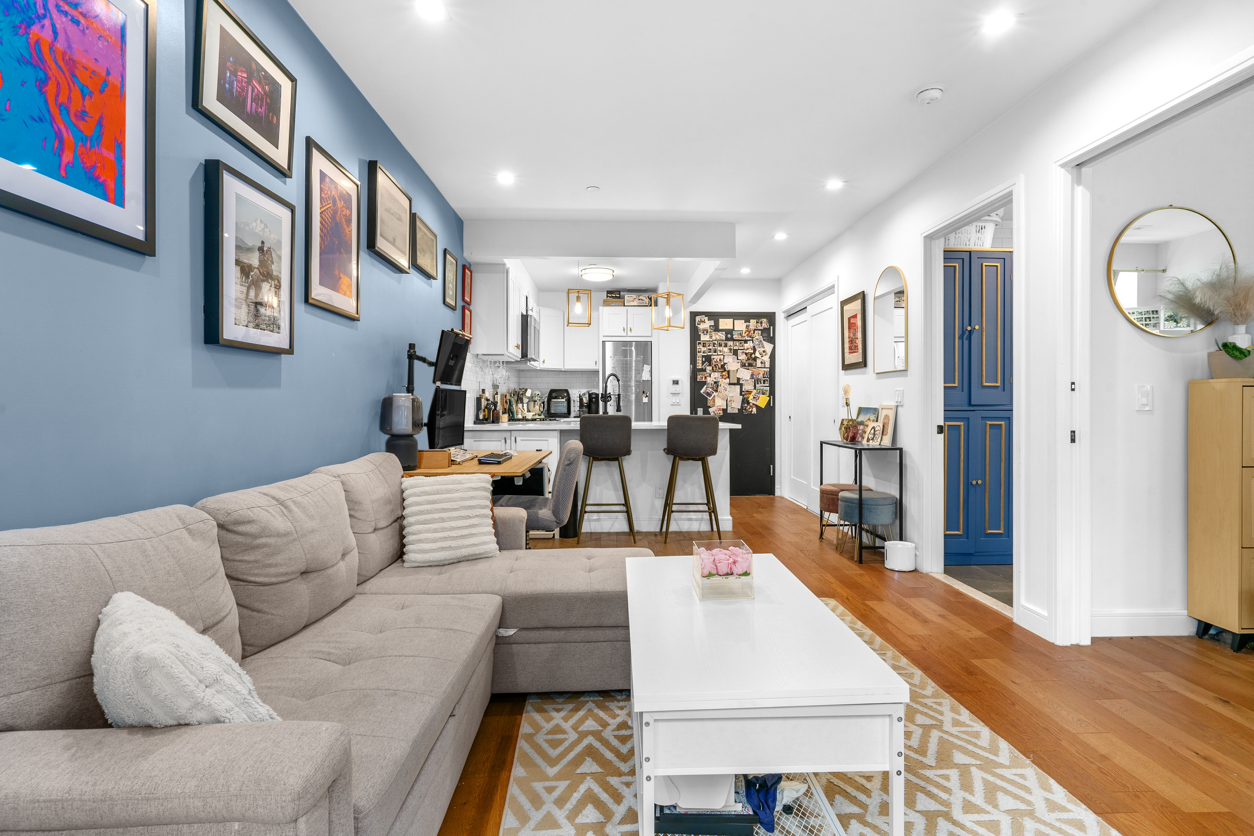 1229 Putnam Avenue, Unit 2A Brooklyn, NY 11221 - Photo 2 of 10 a living room with furniture and view of kitchen