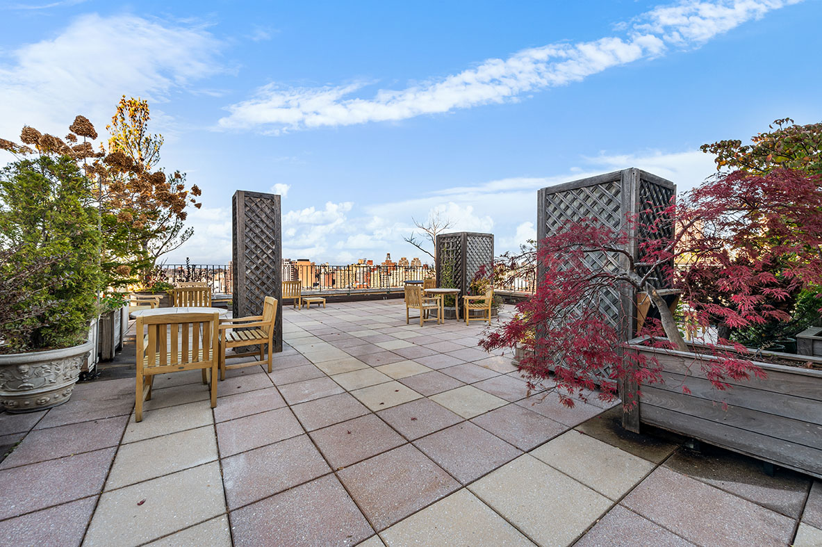 225 Central Park West, Unit 420A Manhattan, NY 10024 - Photo 9 of 14 a terrace with outdoor seating and city view