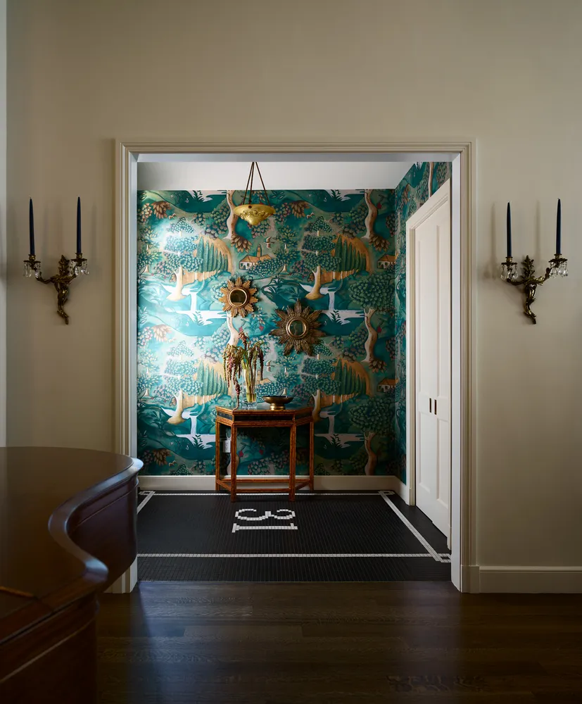 a living room with a flat screen tv and a fireplace
