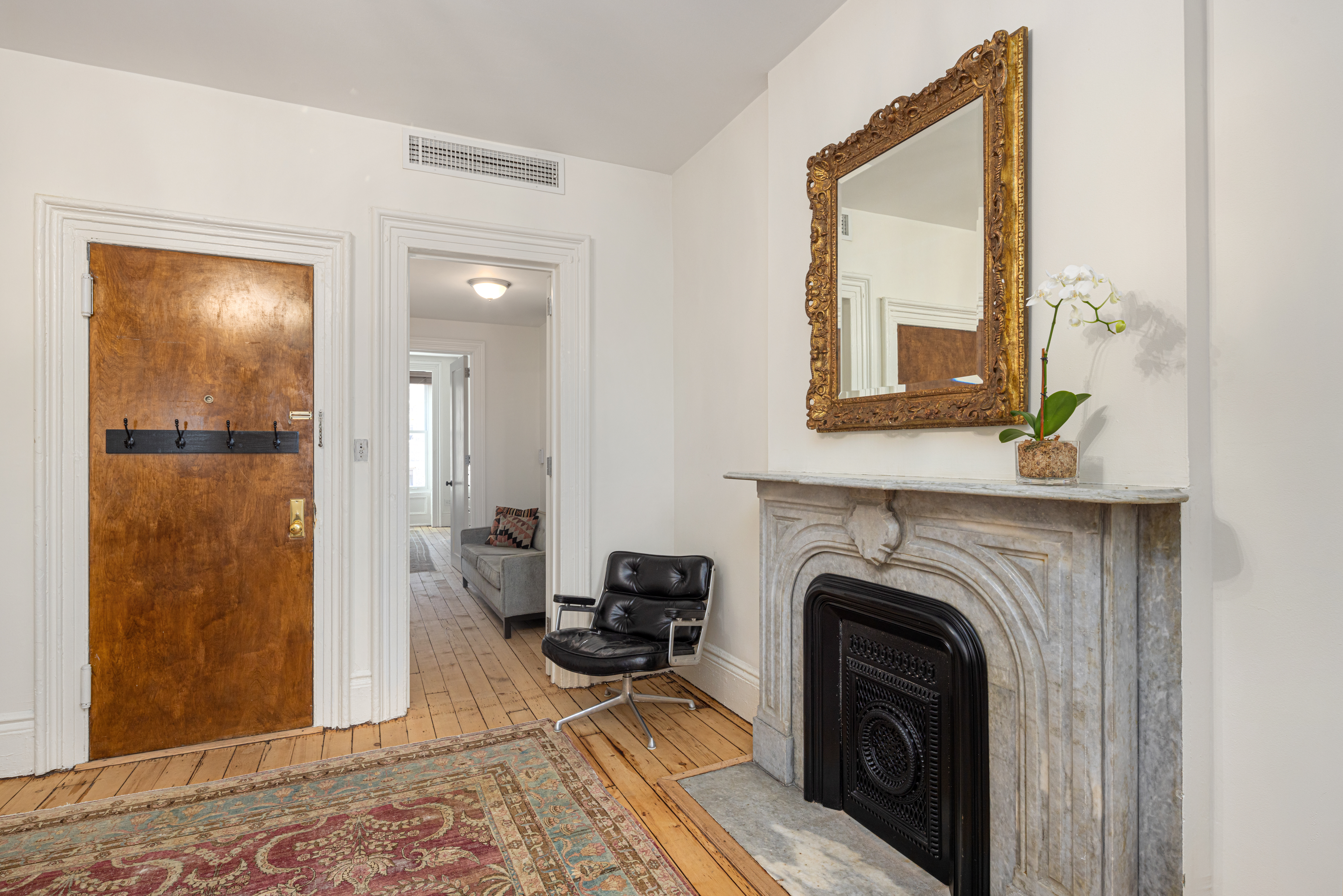 20 Strong Place Brooklyn, NY 11231 - Photo 9 of 21 a view of a livingroom with furniture and a fireplace