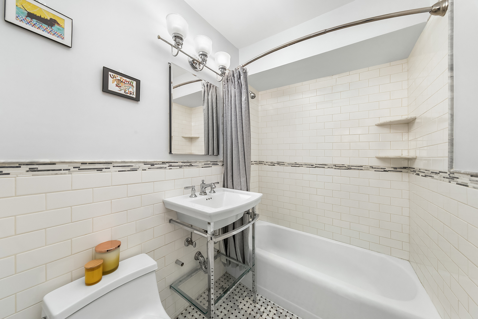 251 East 32nd Street, Unit 19F Manhattan, NY 10016 - Photo 6 of 13 a bathroom with a bathtub a sink and a shower