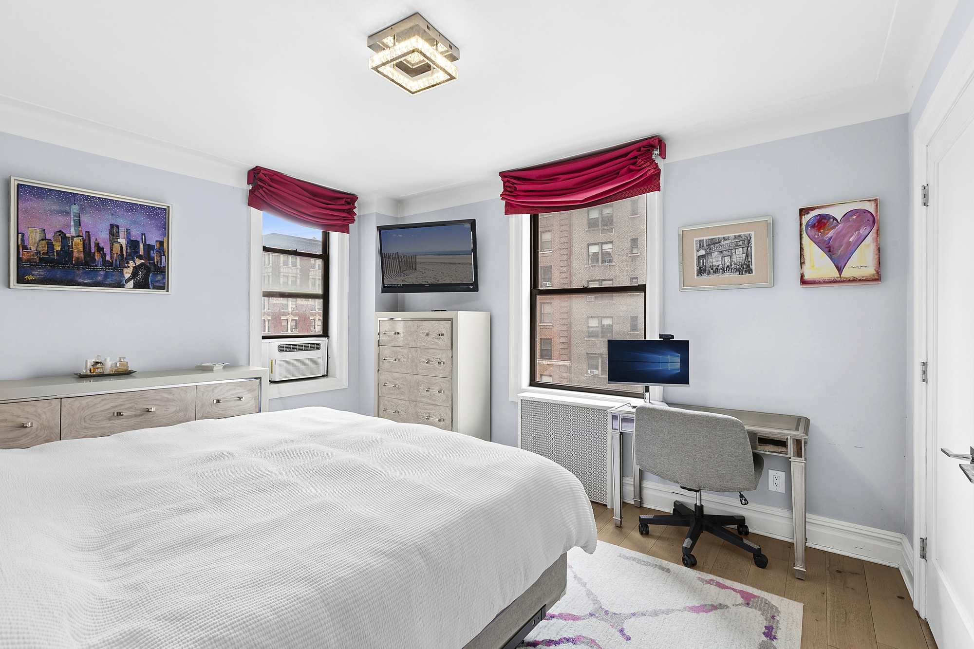 514 West End Avenue, Unit 7B Manhattan, NY 10024 - Photo 5 of 9 a bedroom with a bed and a desk