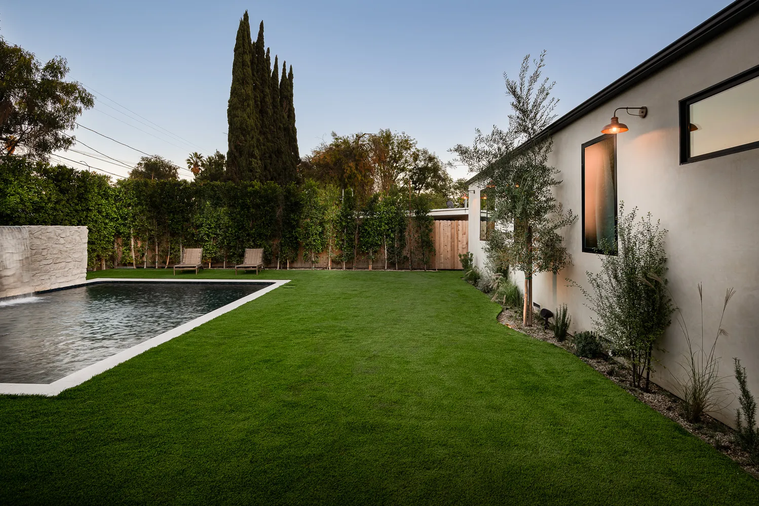a bathroom with a granite countertop sink mirror and double