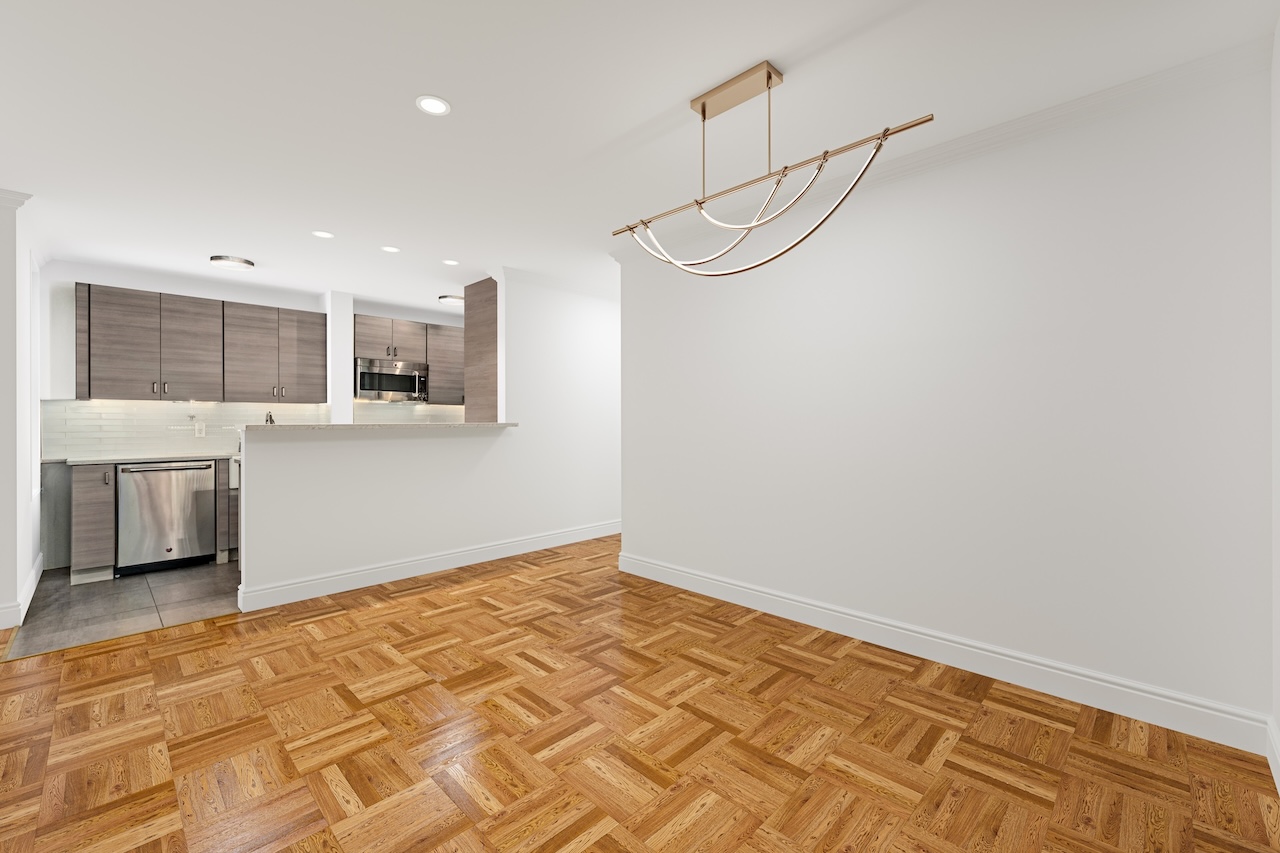 302 East 88th Street, Unit 2G Manhattan, NY 10128 - Photo 8 of 16 a view of a room with a sink