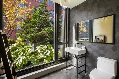 a view of a room with a large window