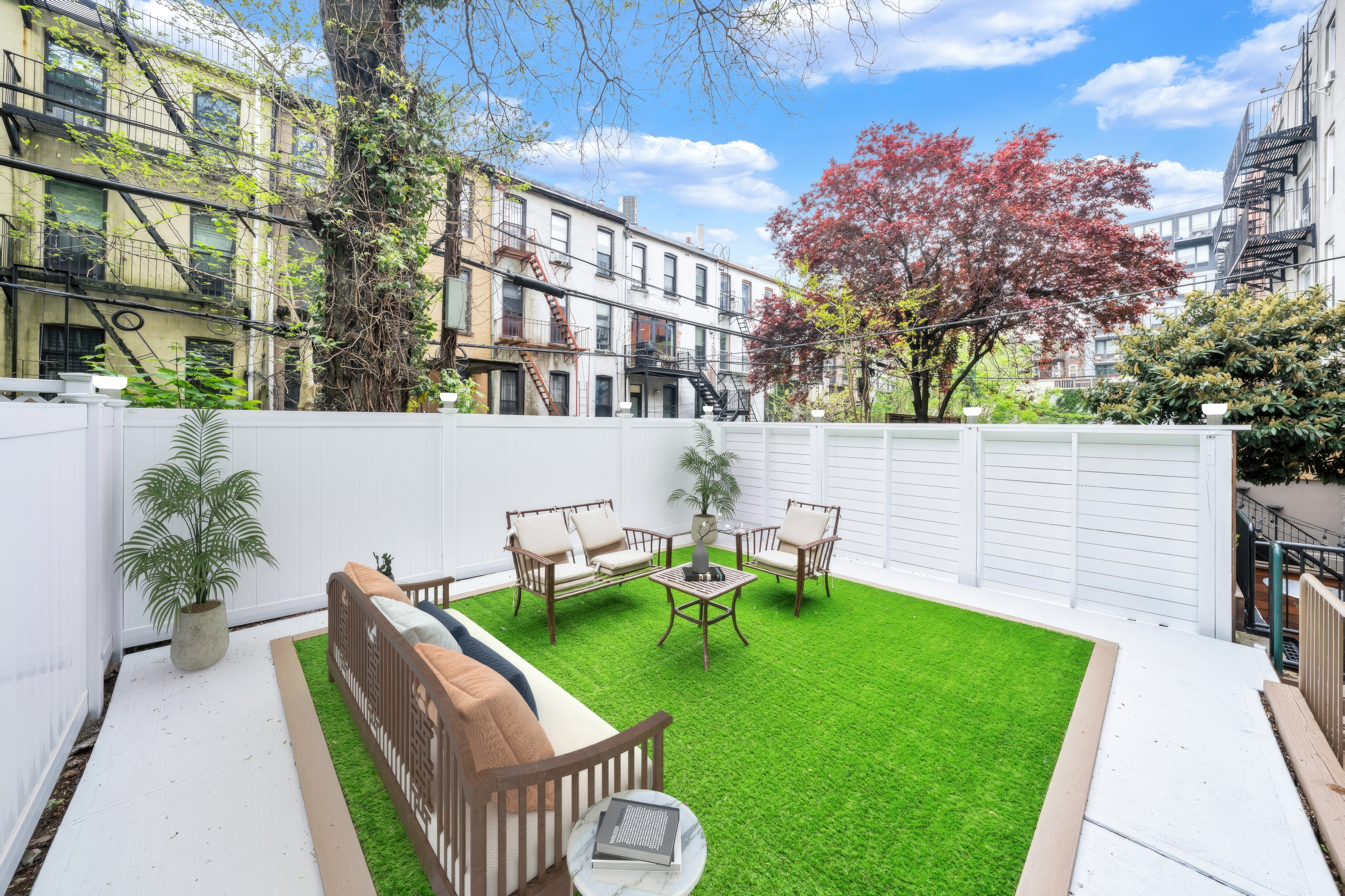 330 Bergen Street, Unit 1/C Brooklyn, NY 11217 - Photo 10 of 11 a view of a chair and table in the backyard