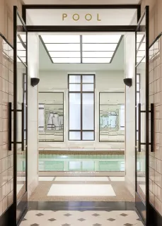 a view of a living room and a floor to ceiling window
