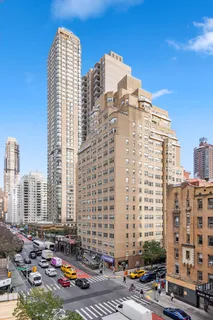 a view of a city with tall buildings