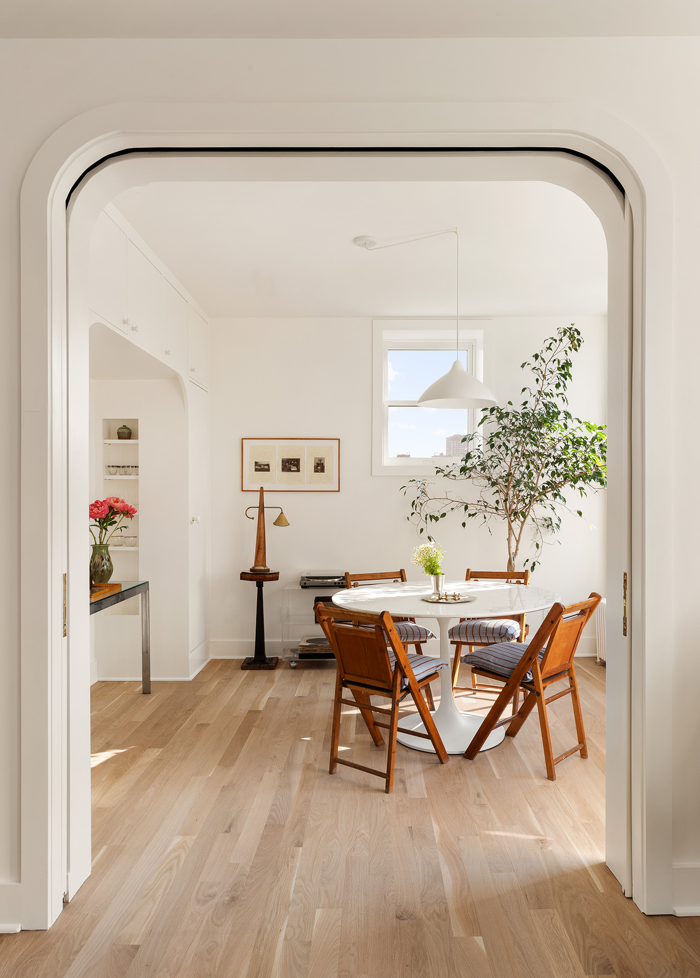 99 Avenue B, Unit PHDE Manhattan, NY 10009 - Photo 7 of 18 a workspace with furniture and window