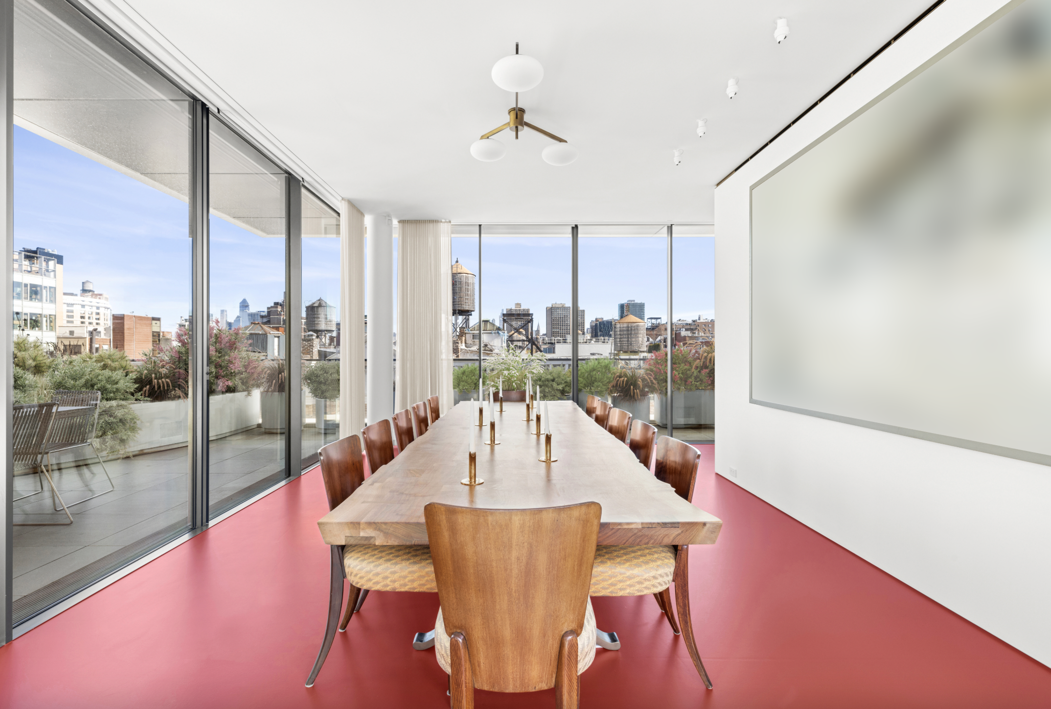 27 Wooster Street, Unit PH Manhattan, NY 10013 - Photo 3 of 34 a view of a dining room with furniture window and wooden floor