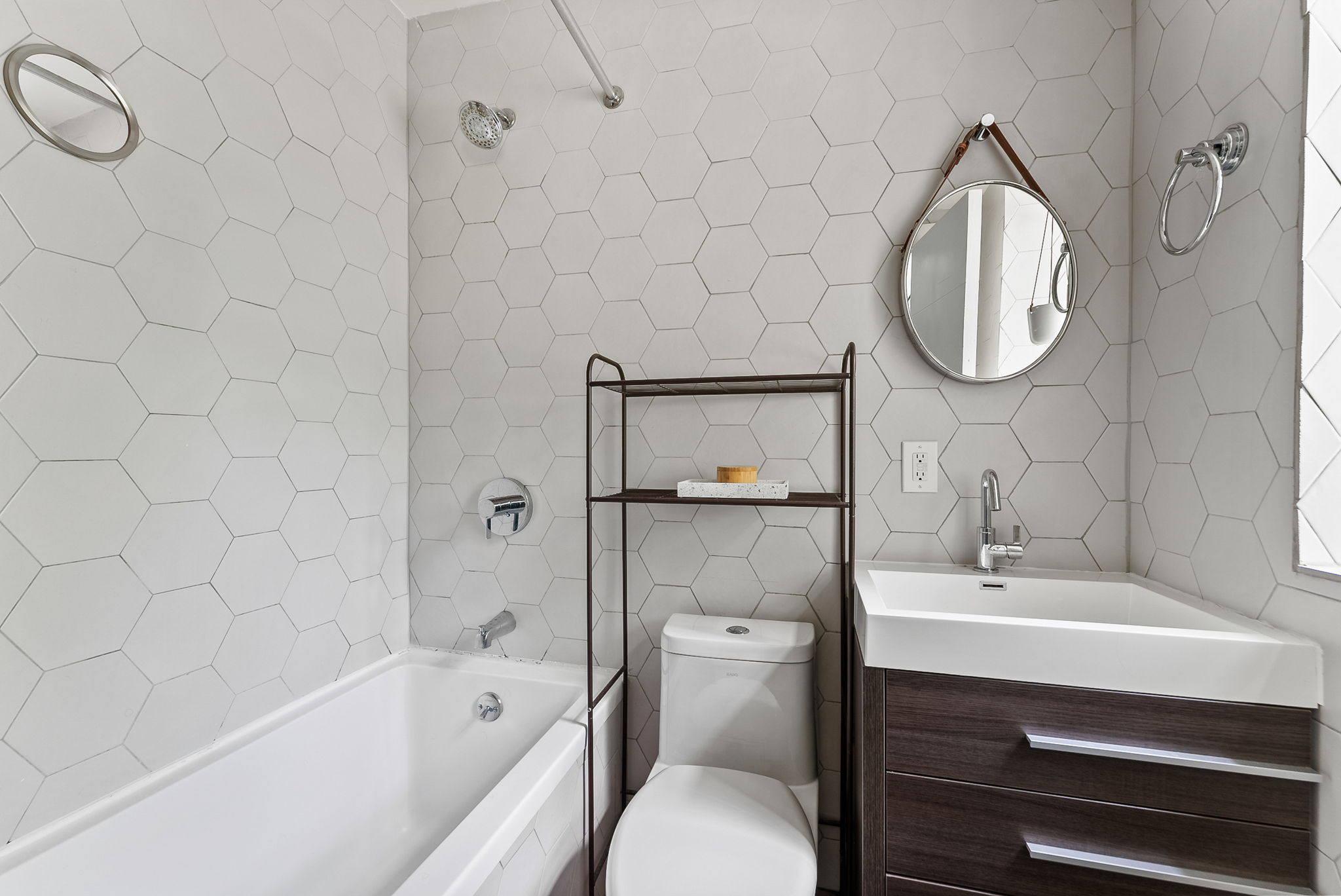 600 Prospect Place, Unit 2 Brooklyn, NY 11238 - Photo 9 of 13 a bathroom with a toilet sink and a mirror