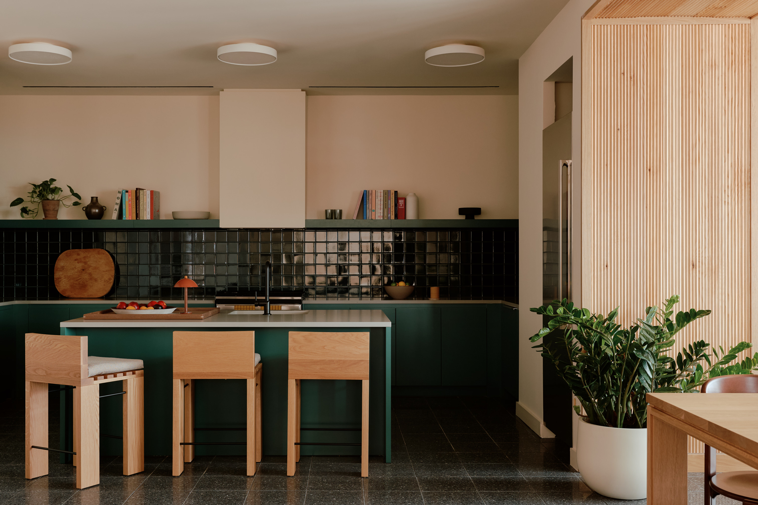 2035 5th Avenue, Unit 20A Manhattan, NY 10035 - Photo 11 of 14 a kitchen with a table and chairs in it