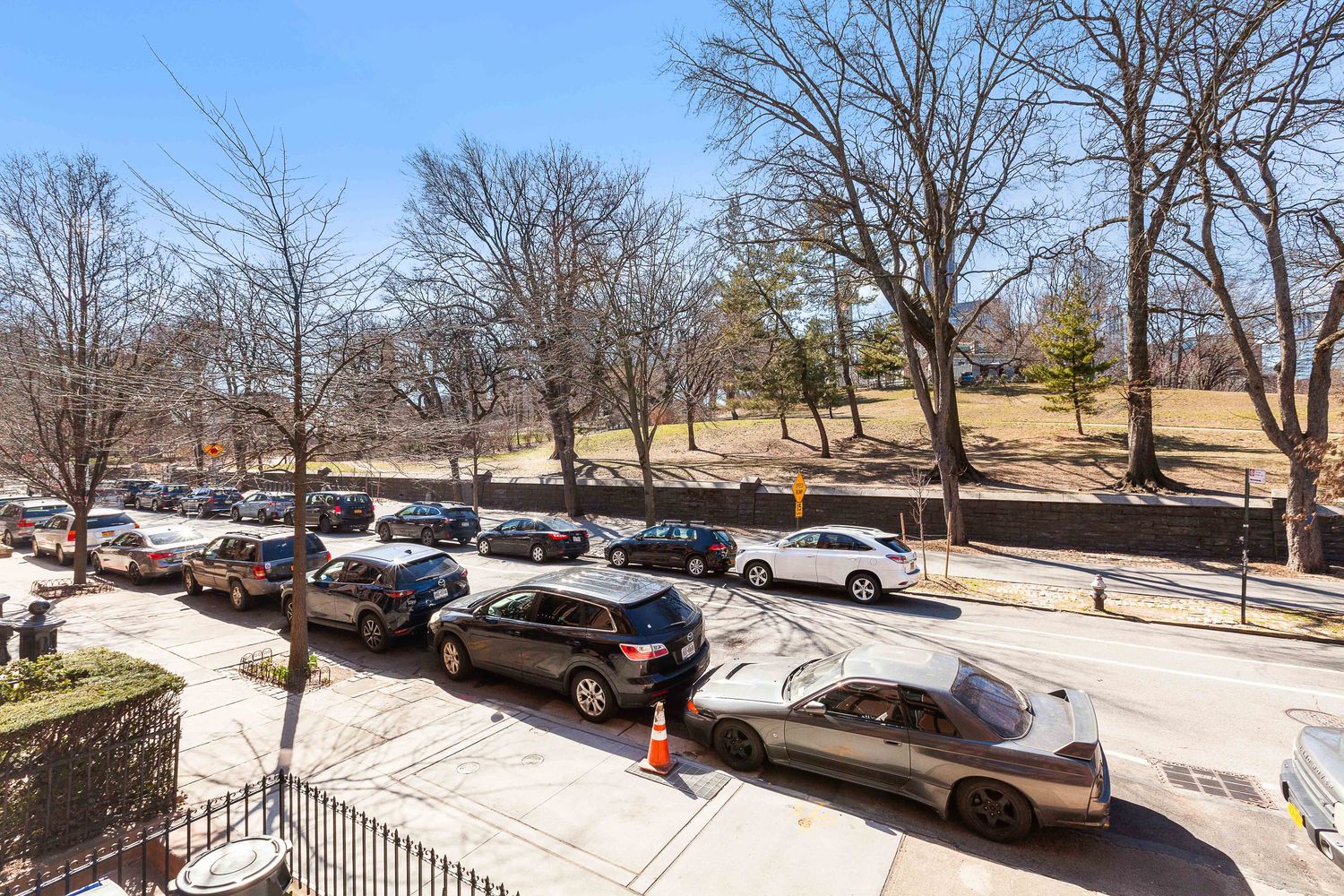 166 Washington Park, Unit 2 Brooklyn, NY 11205 - Photo 8 of 9 a cars parked on the side of a street