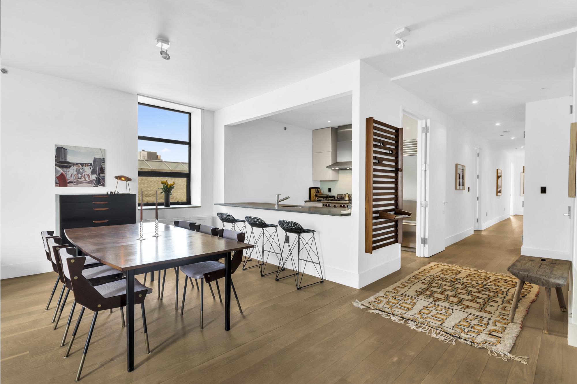 267 West 124th Street, Unit 6A Manhattan, NY 10027 - Photo 8 of 24 a dining room with a table and chairs