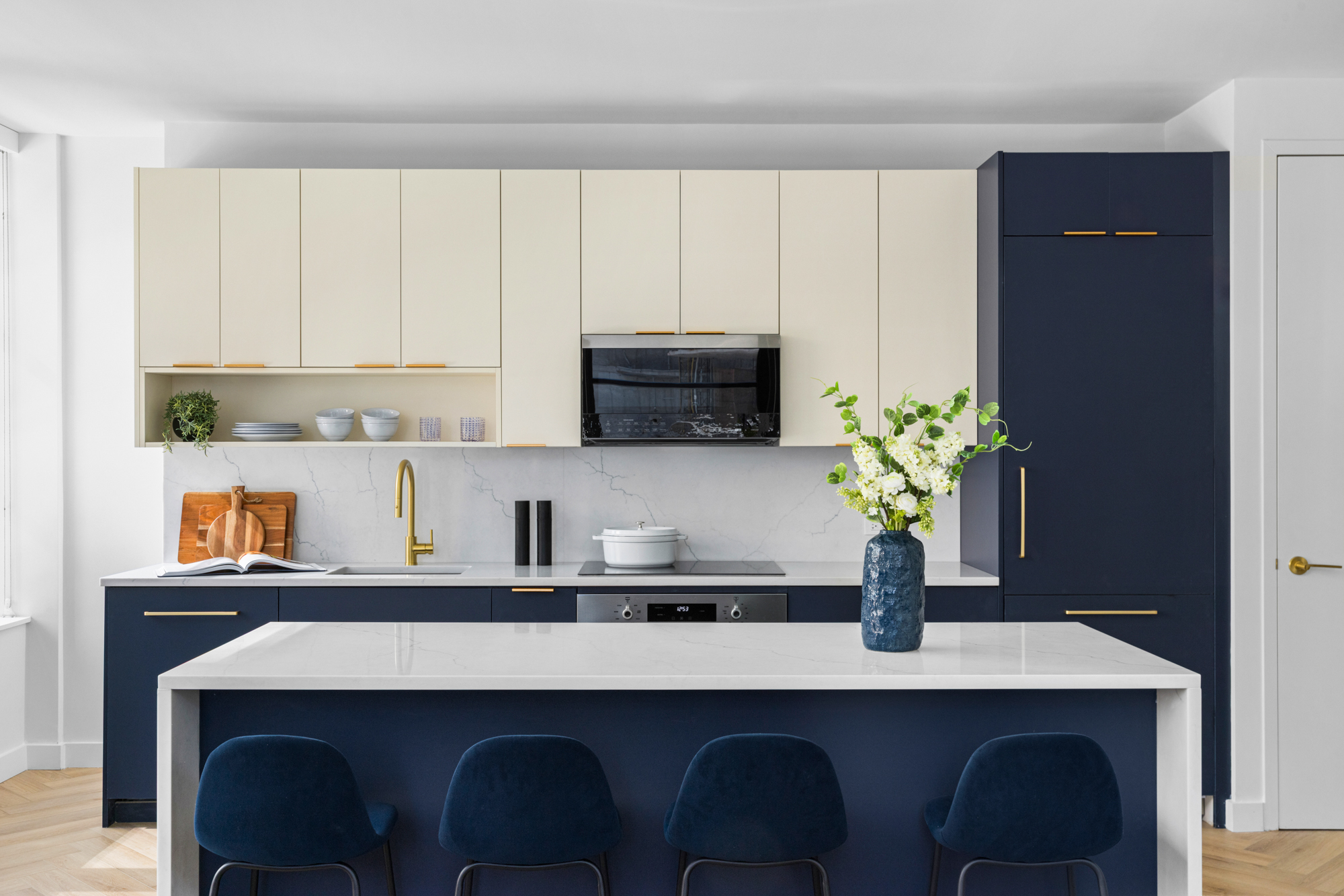 a kitchen with a table and chairs in it