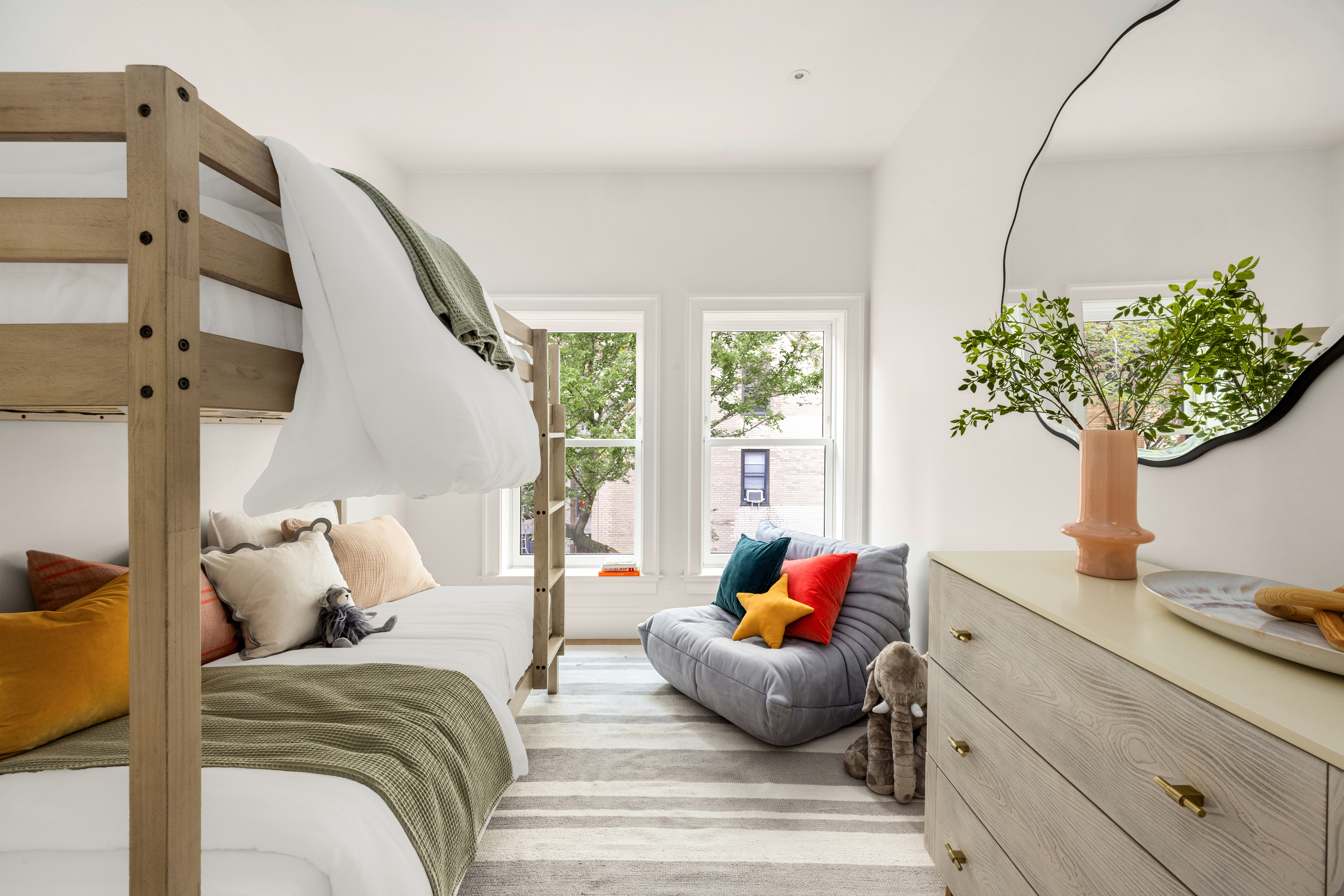 344 West 84th Street, Unit PH Manhattan, NY 10024 - Photo 11 of 19 a living room with furniture flowerpot and wooden floor