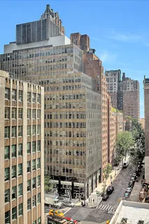 a view of a building with a street