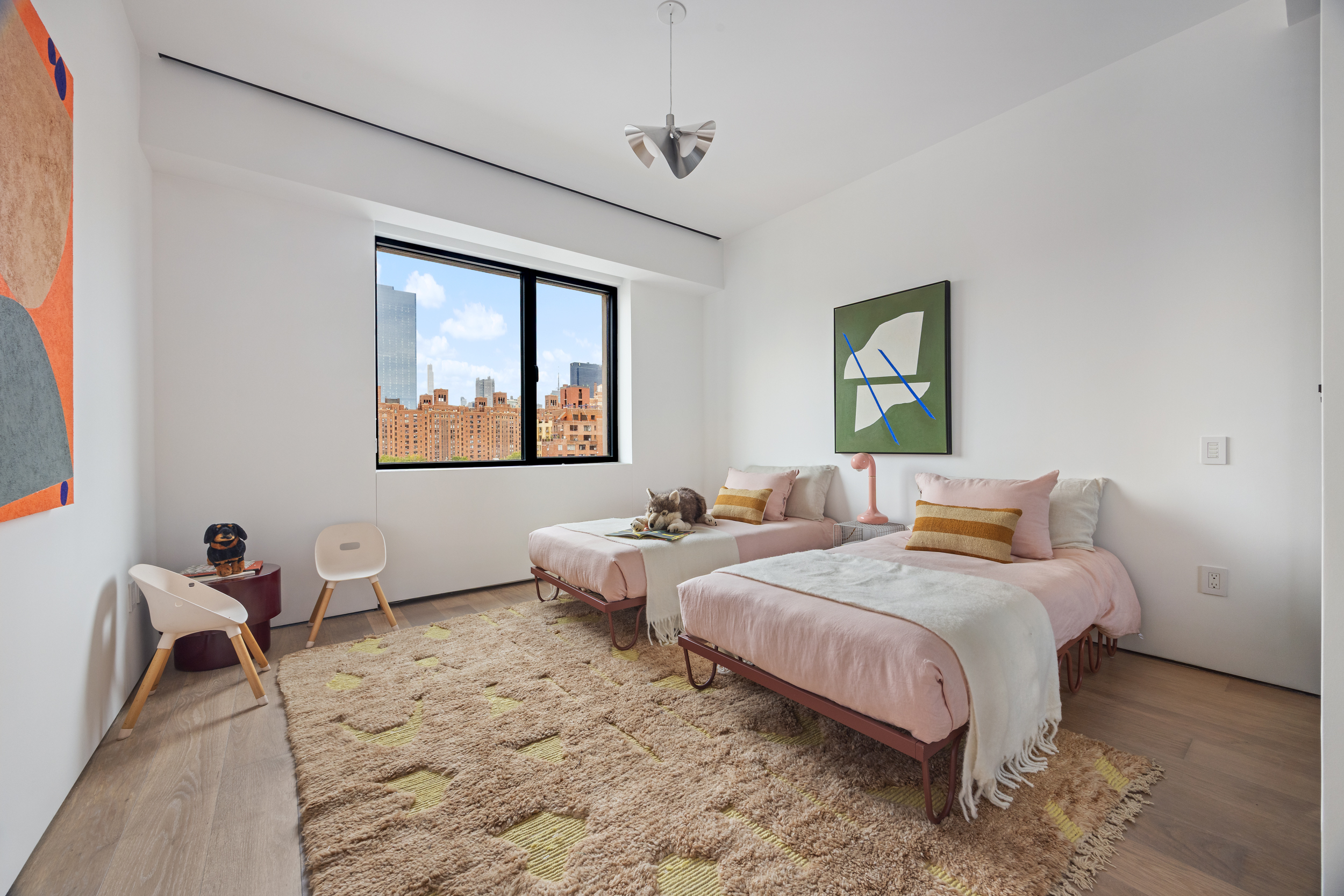 455 West 19th Street, Unit PH2 Manhattan, NY 10011 - Photo 20 of 26 a bedroom with a bed and a window