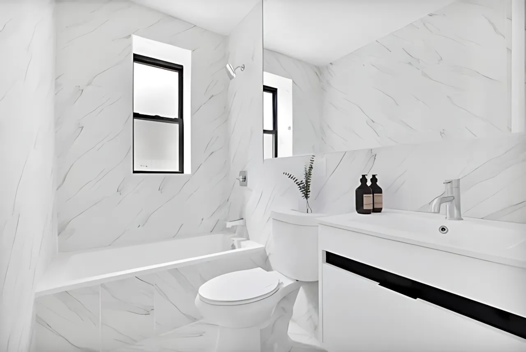 640 Ditmas Avenue, Unit 16 Brooklyn, NY 11218 - Photo 5 of 8 a bathroom with a sink toilet and shower