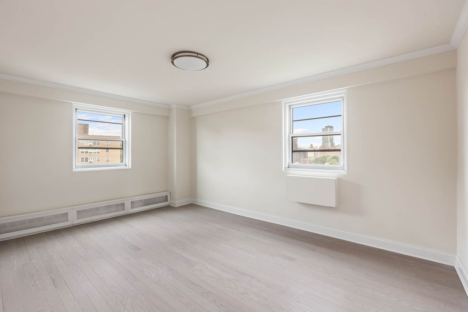 an empty room with windows