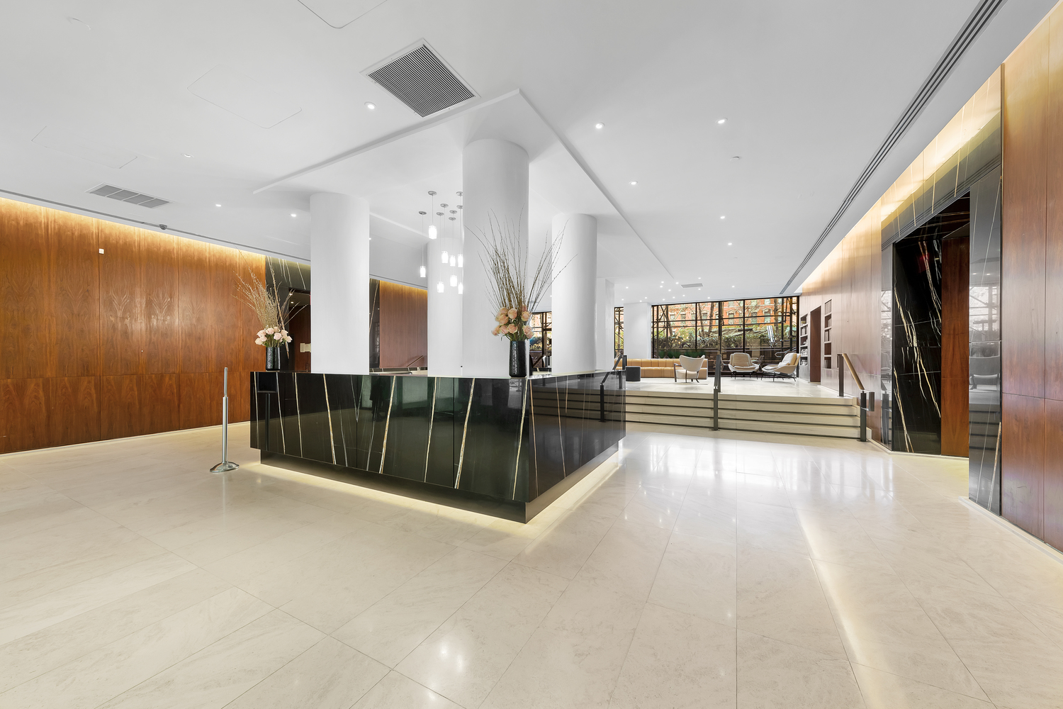 515 East 72nd Street, Unit 36B Manhattan, NY 10021 - Photo 23 of 36 a view of a hallway with a large kitchen area