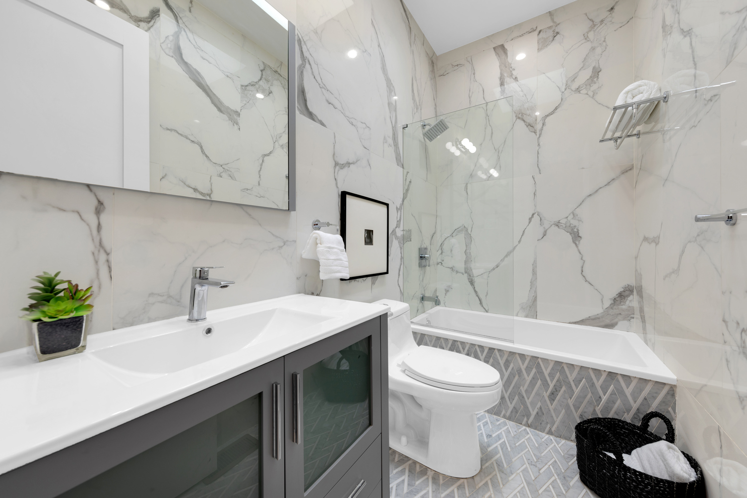 1118 Decatur Street Brooklyn, NY 11207 - Photo 9 of 18 a bathroom with a sink toilet and shower