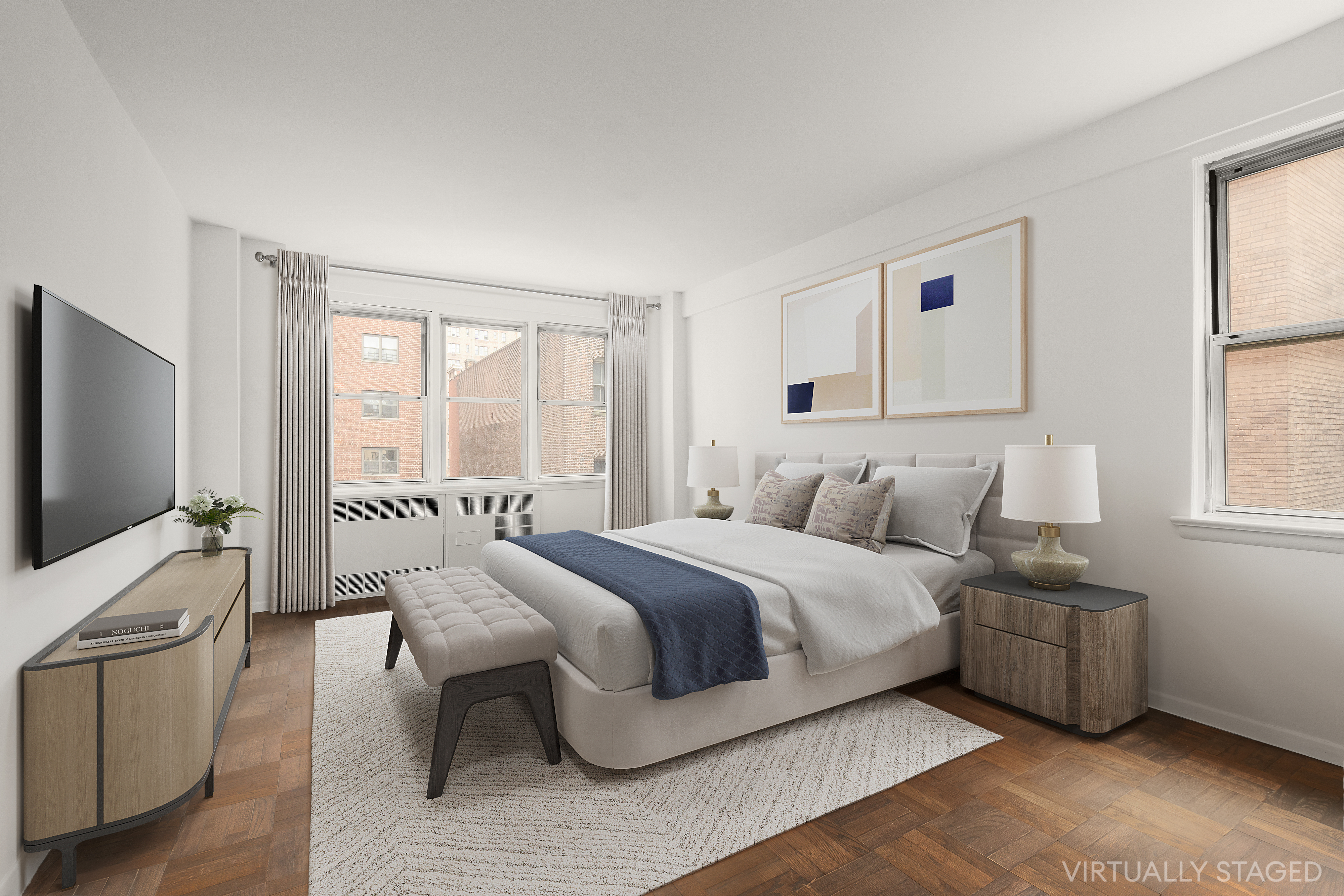 174 East 74th Street, Unit 8C Manhattan, NY 10021 - Photo 4 of 5 a bedroom with a bed and large window