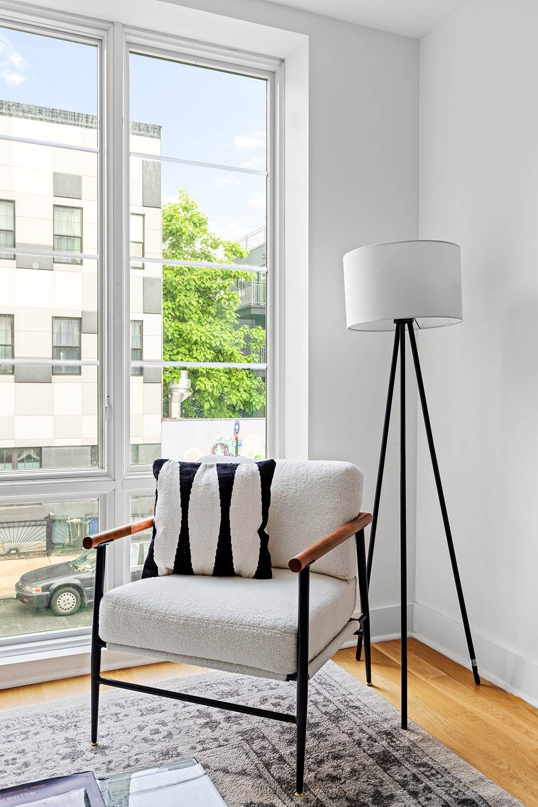 40 Schaefer Street, Unit 2R Brooklyn, NY 11207 - Photo 4 of 10 a living room with furniture and a window