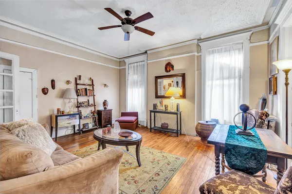 a living room with furniture and a window