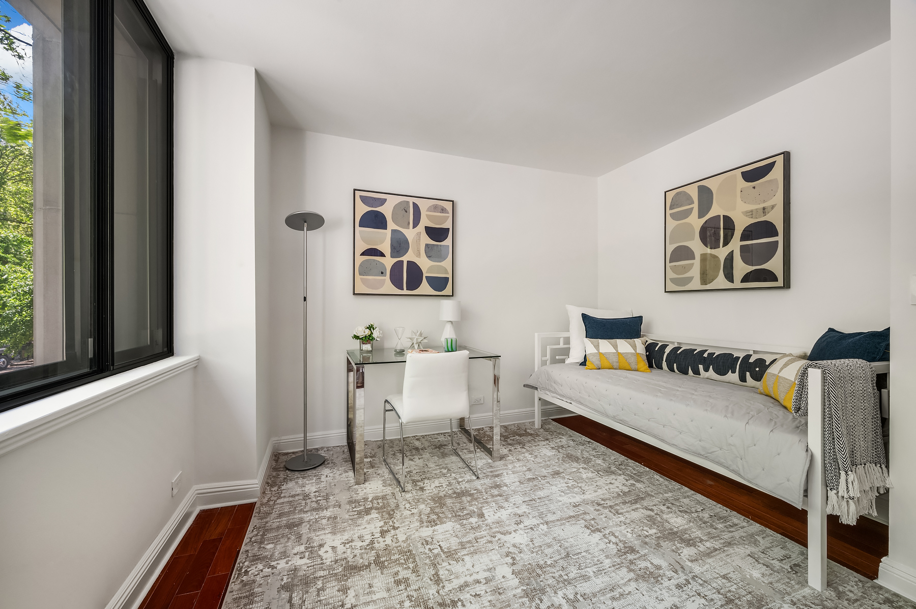 386 Columbus Avenue, Unit 2A Manhattan, NY 10024 - Photo 8 of 9 a living room with furniture and a window