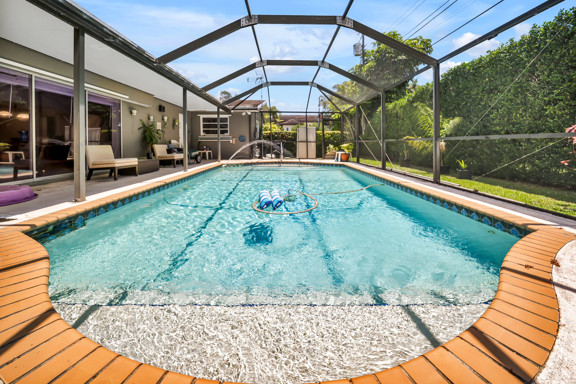 6760 Southwest 62nd Terrace Miami, FL 33143 - Photo 4 of 38 a view of a backyard with sitting area