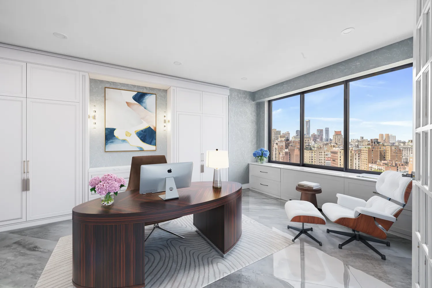 a living room with furniture and large windows