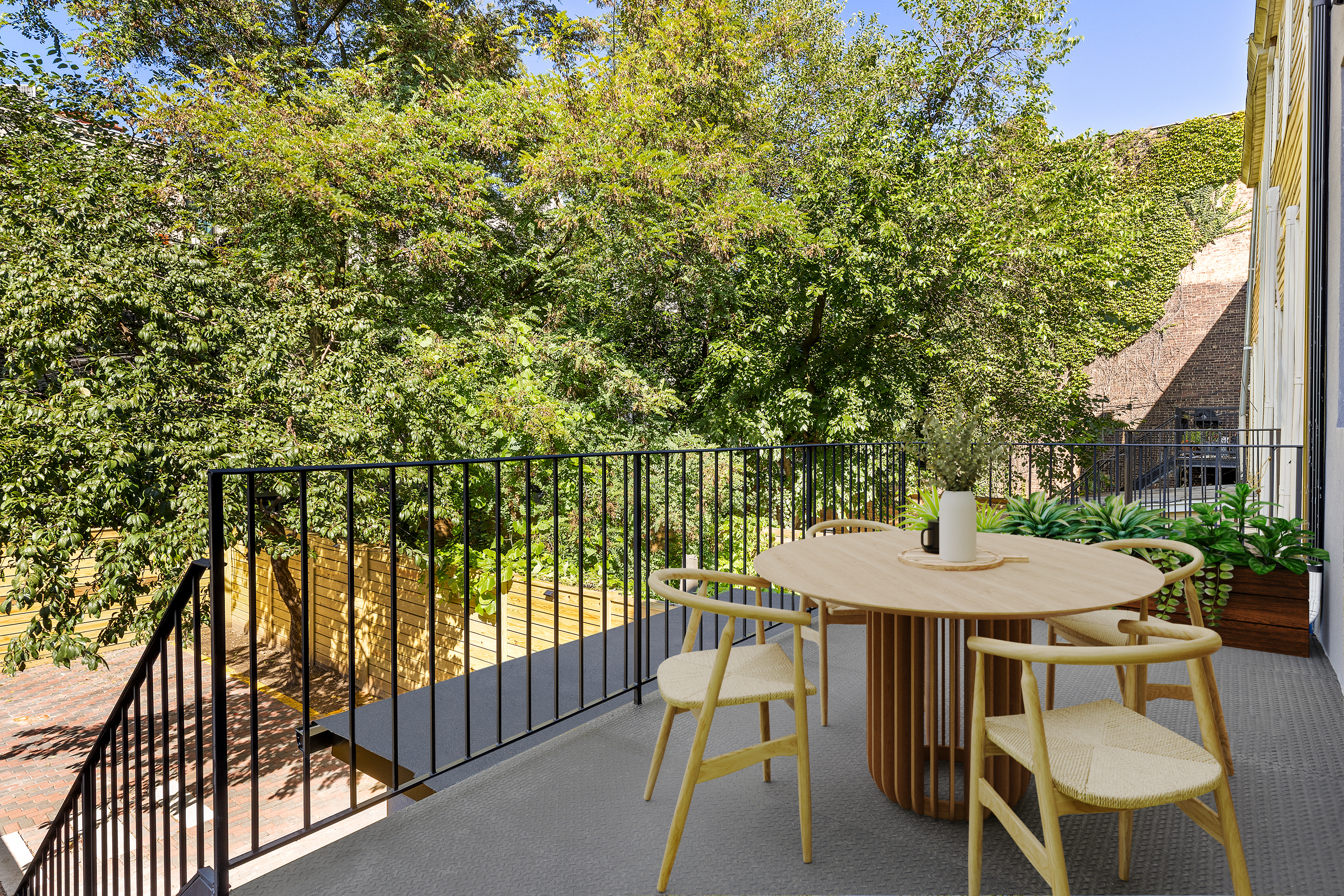 661 Decatur Street Brooklyn, NY 11233 - Photo 6 of 13 a view of a patio with a table and chairs