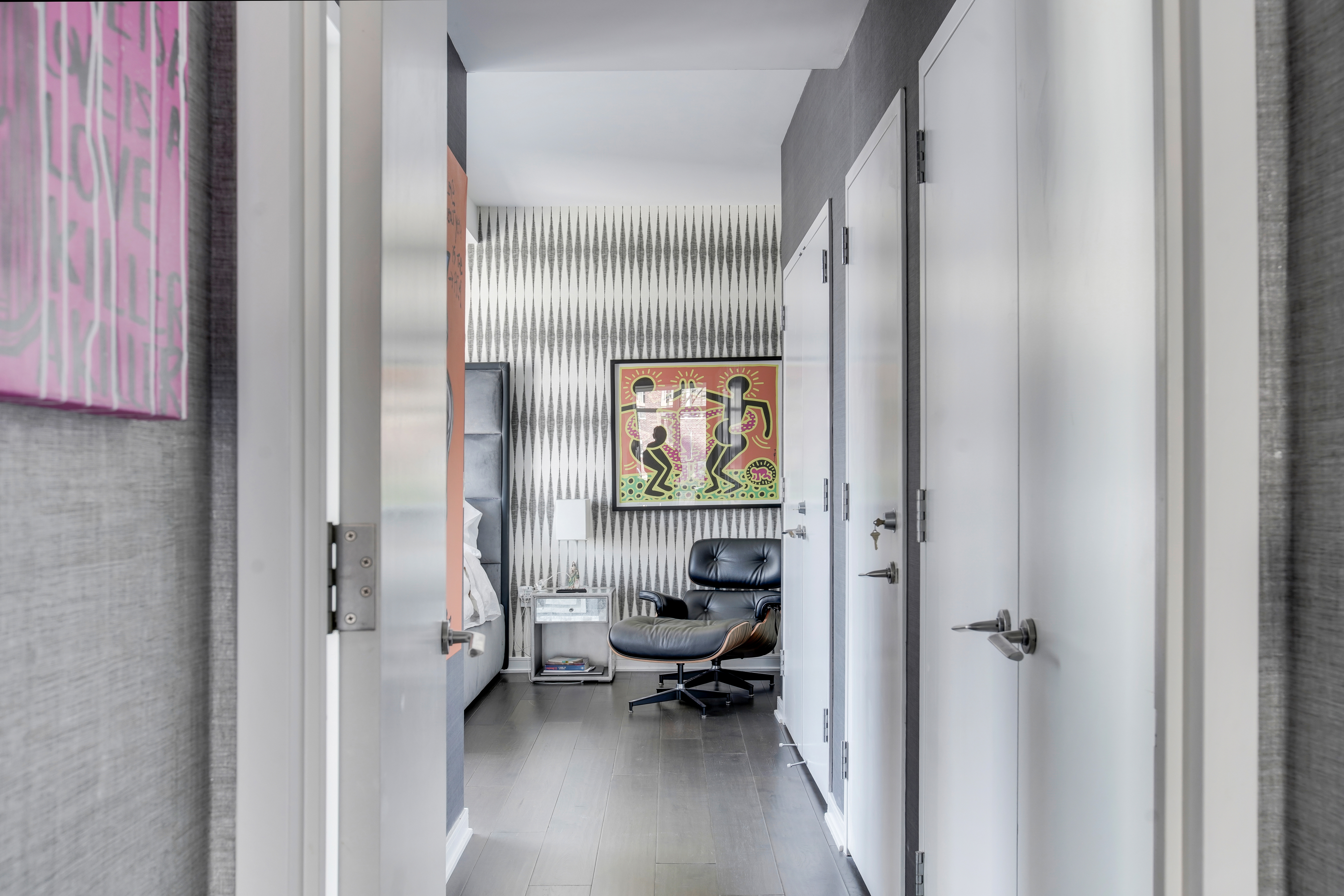 207 East 57th Street, Unit 20A Manhattan, NY 10022 - Photo 8 of 18 a view of a hallway with couch and a window