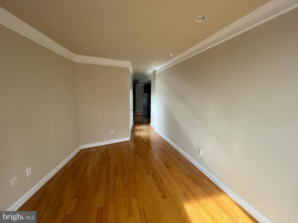 1033 Park Road Northwest, Unit 6 Washington, DC 20010 - Photo 14 of 38 a view of empty room with wooden floor