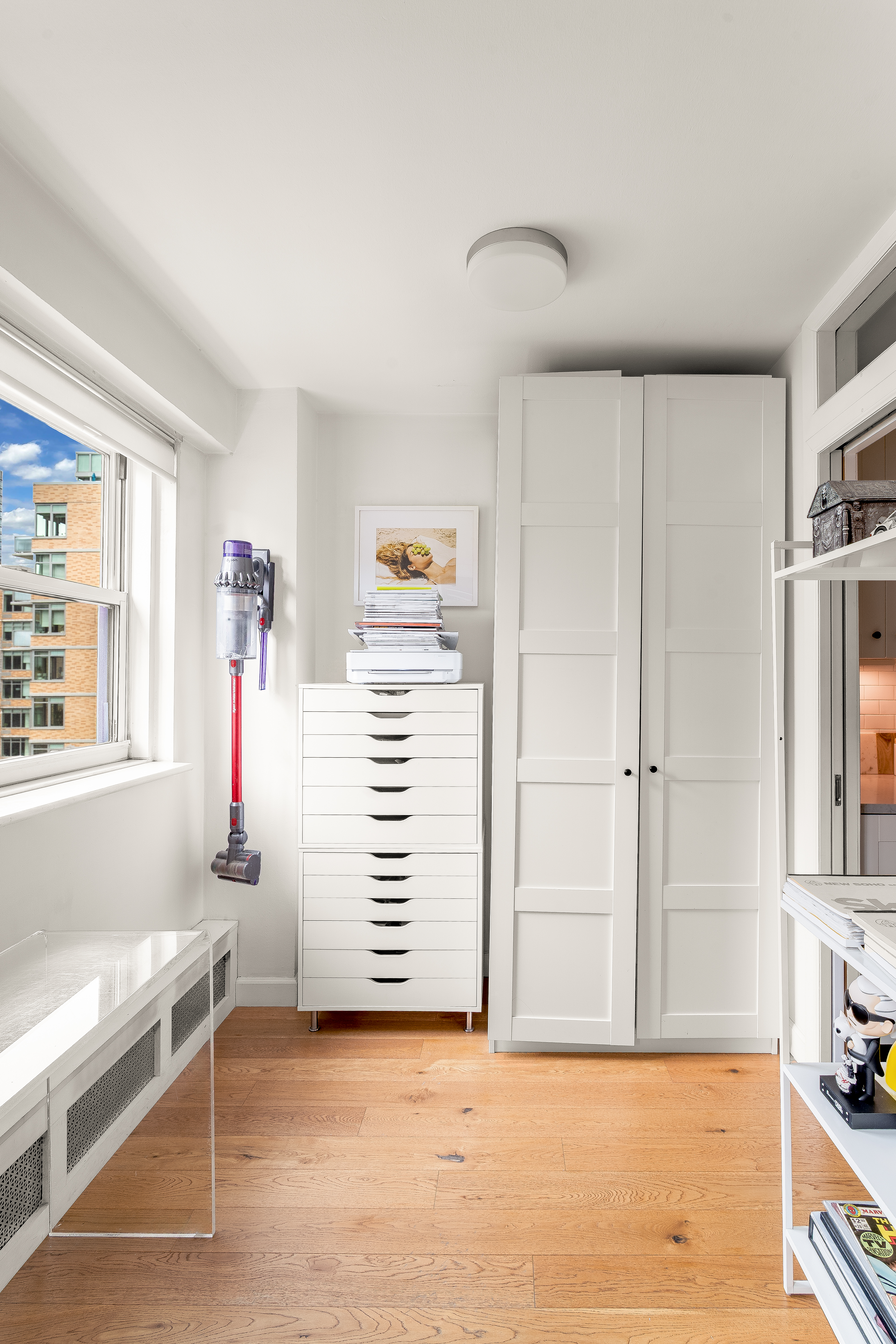 191 Willoughby Street, Unit 12J Brooklyn, NY 11201 - Photo 8 of 19 a view of empty room with wooden floor and window
