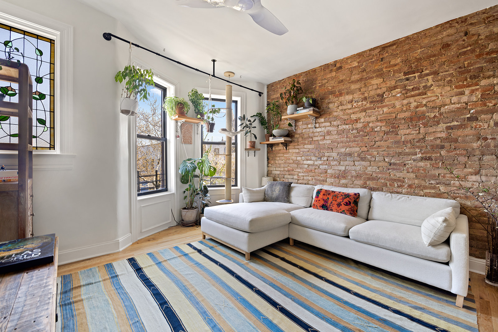 114 Garfield Place, Unit 4L Brooklyn, NY 11215 - Photo 2 of 11 a living room with furniture and a rug