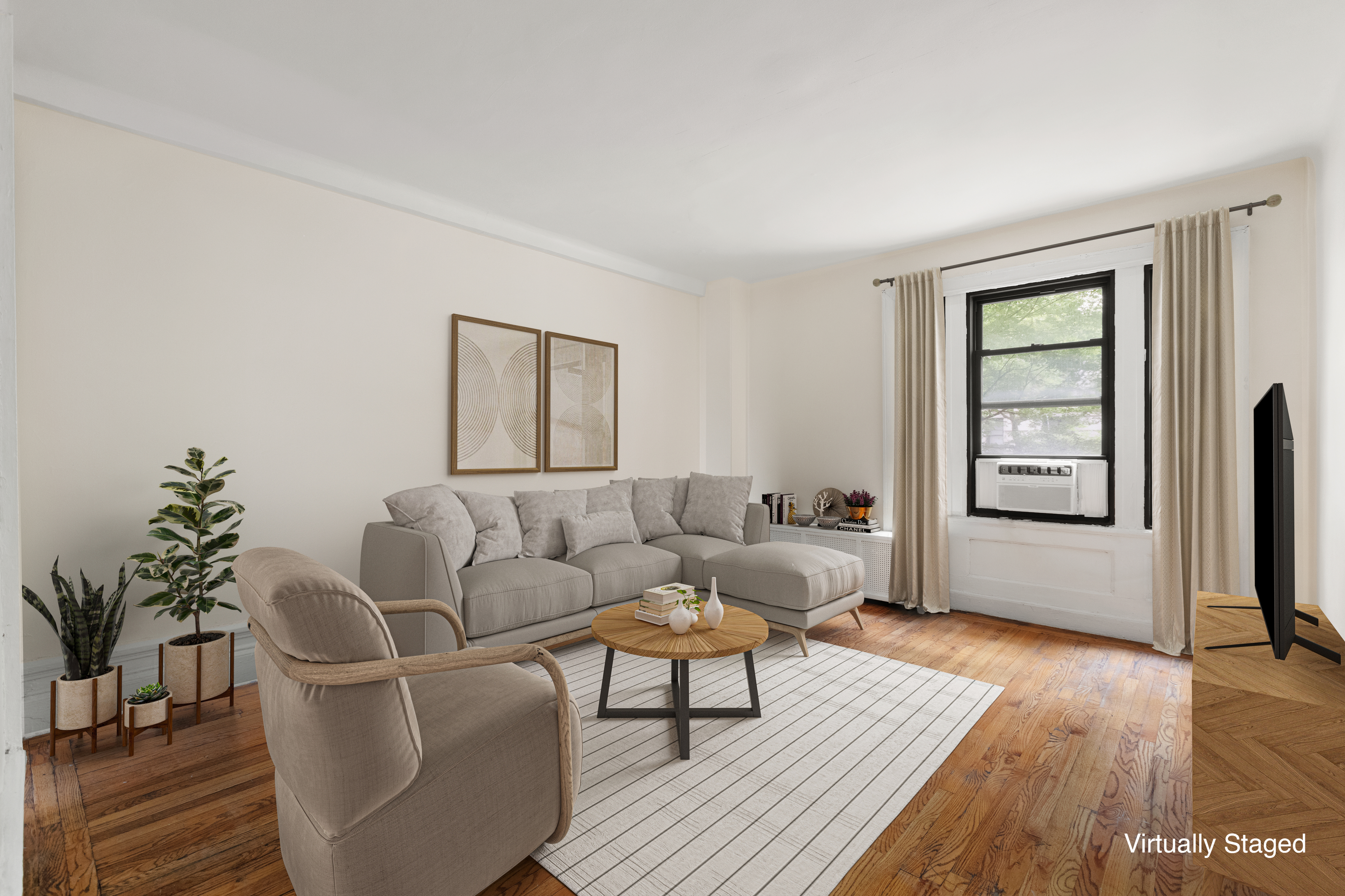 510 West 110th Street, Unit 2E Manhattan, NY 10025 - Photo 1 of 13 a living room with furniture a wooden floor and a potted plant
