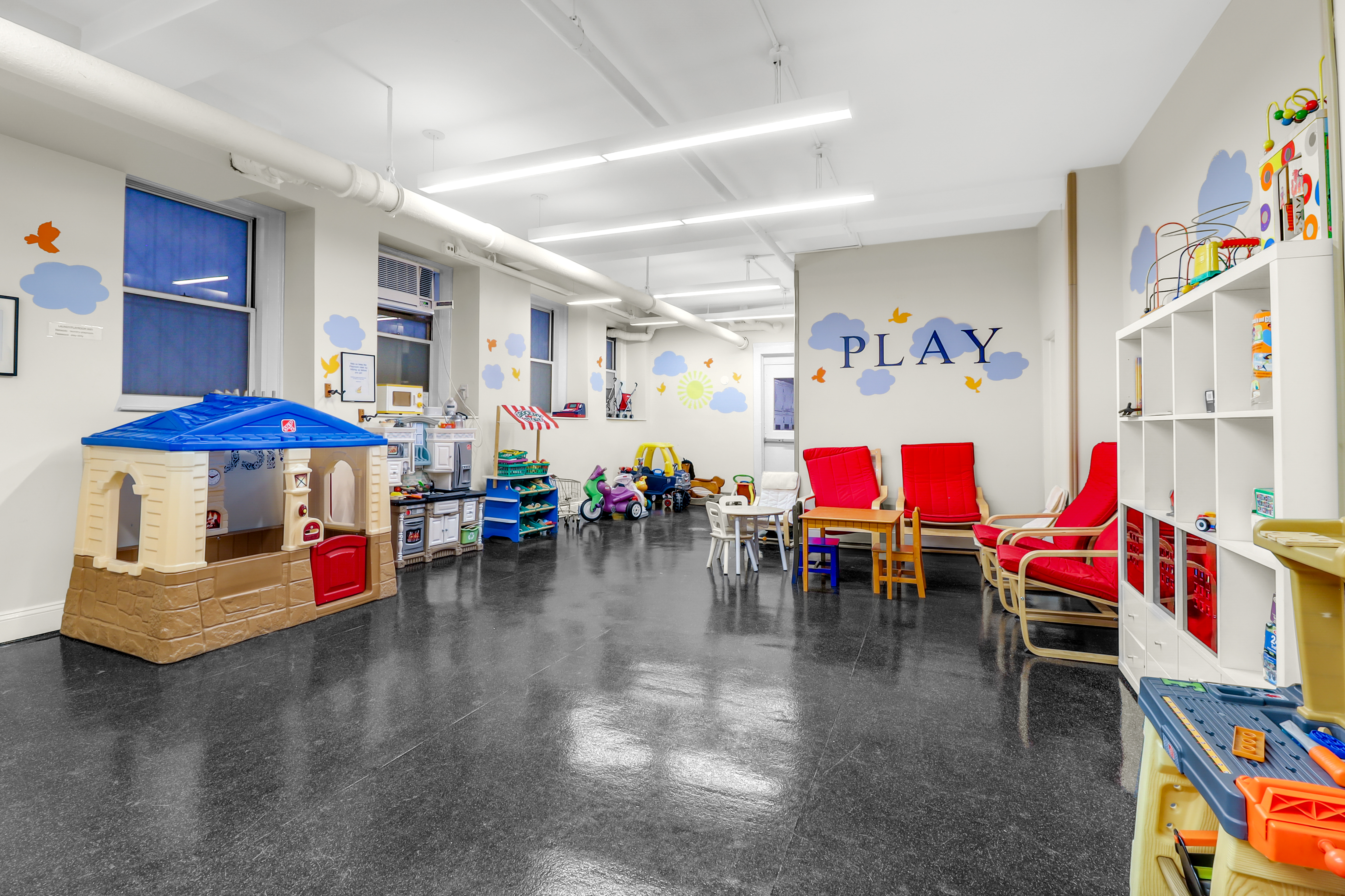 215 West 91st Street, Unit 77 Manhattan, NY 10024 - Photo 13 of 17 a living room with lots of furniture and white walls