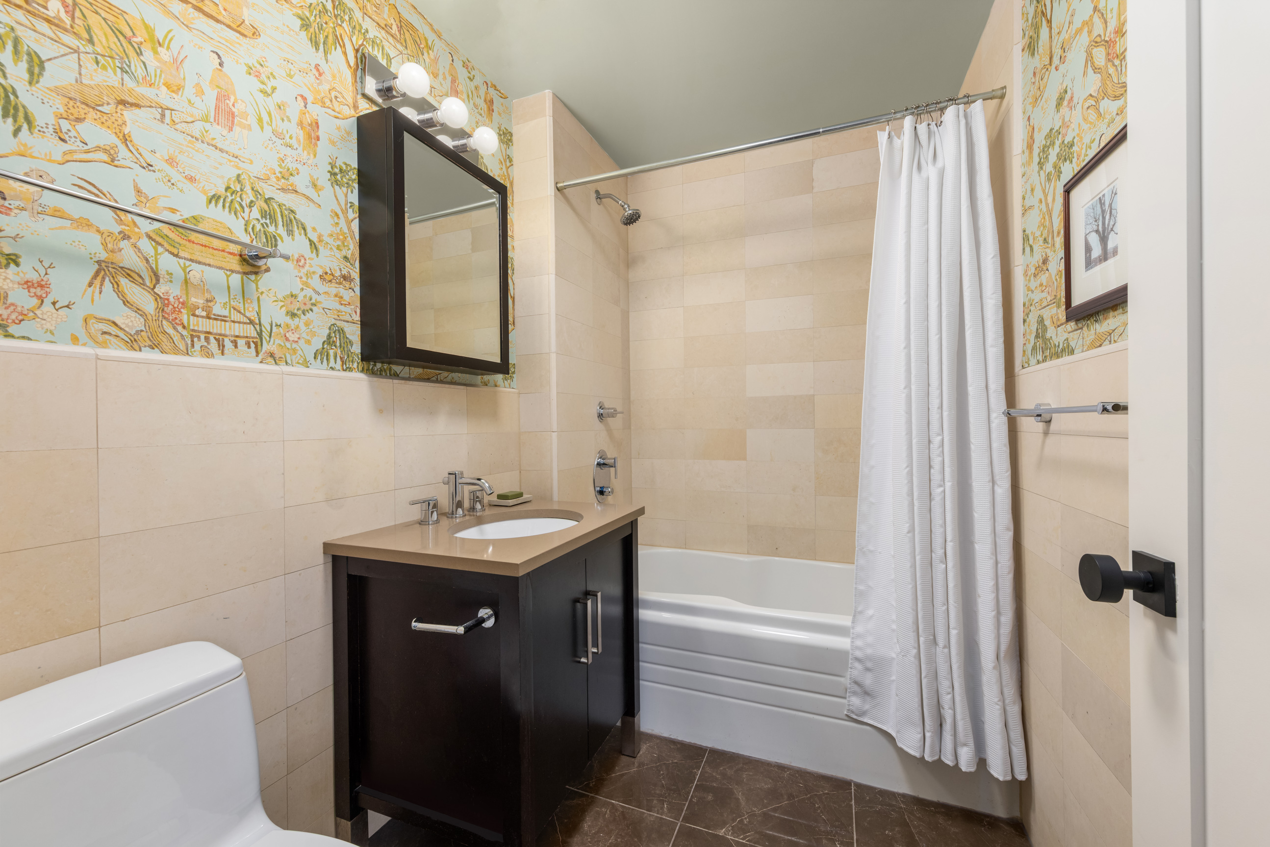 301 West 118th Street, Unit PH1C Manhattan, NY 10026 - Photo 6 of 12 a bathroom with a sink a toilet and shower