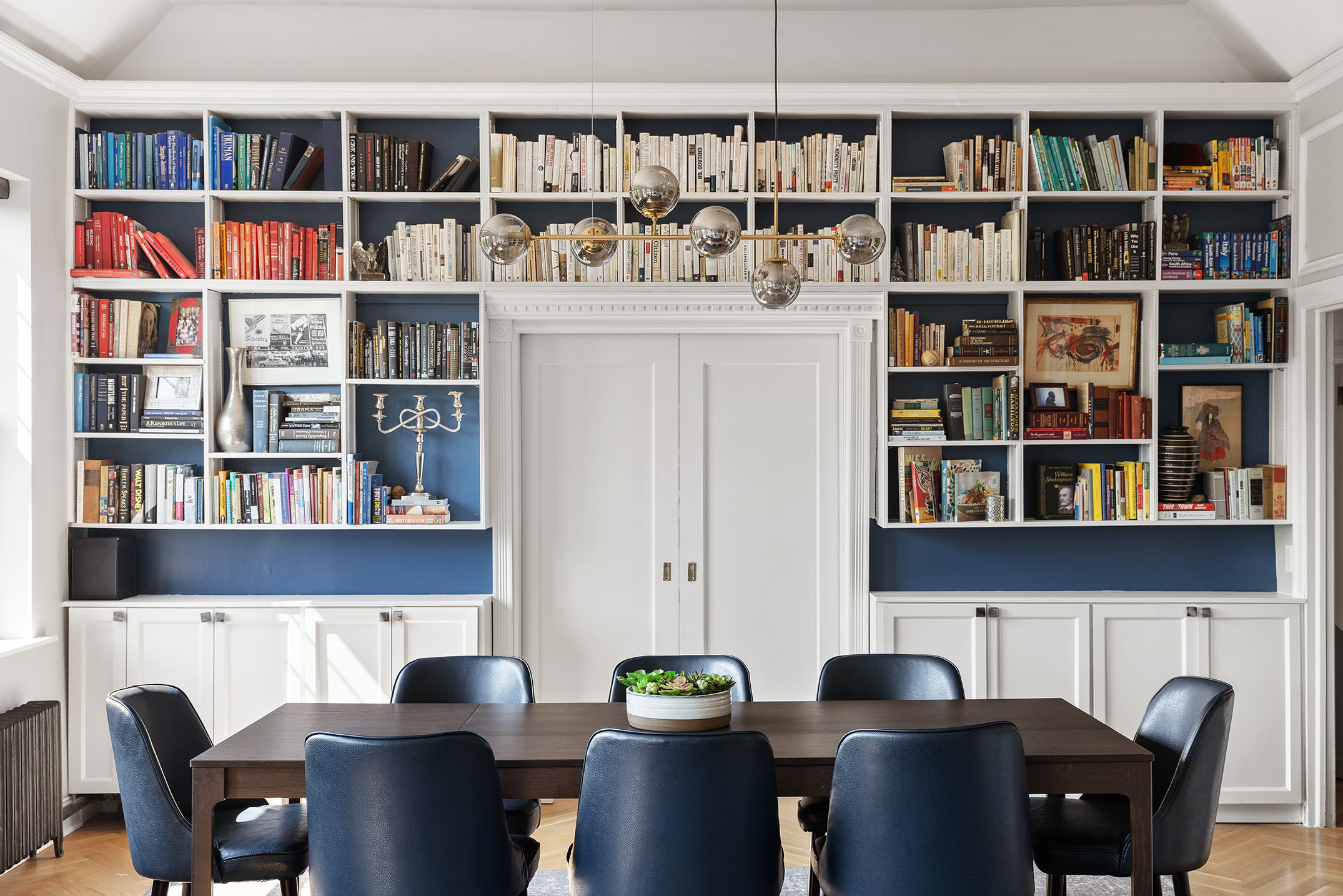 370 Central Park West, Unit PH601 Manhattan, NY 10025 - Photo 5 of 19 a work place with furniture and book shelf